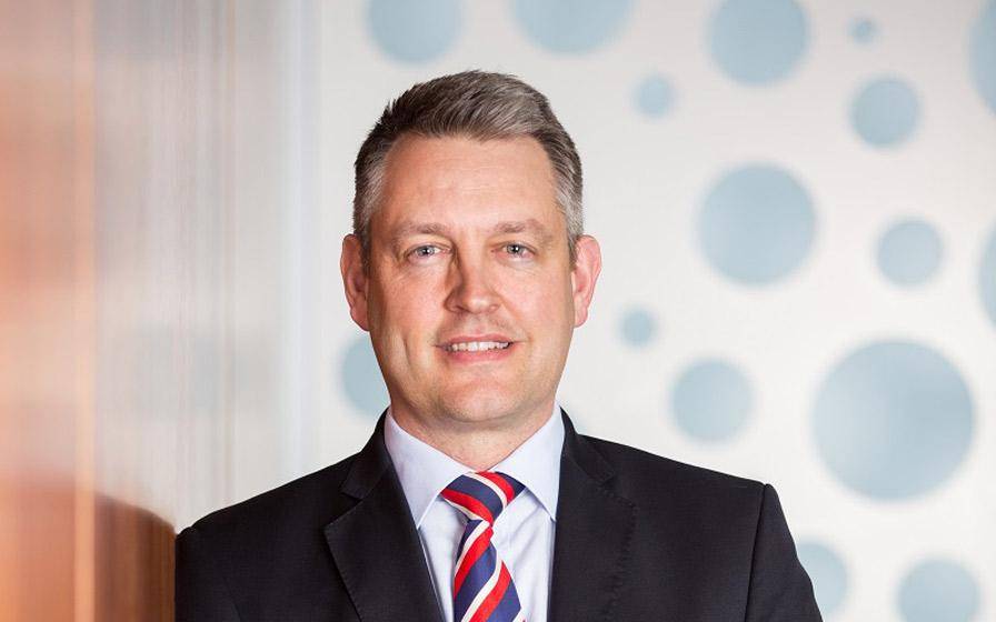 Former NZ boss takes charge at AMP