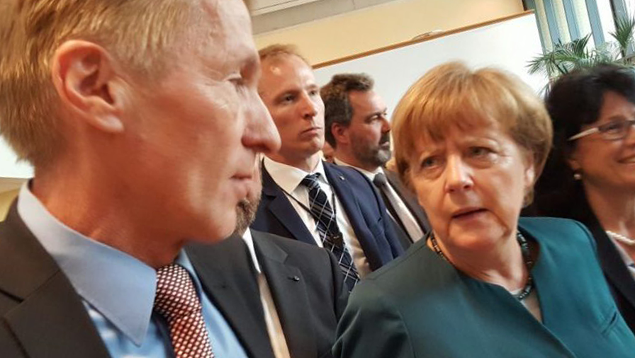 German Chancellor Angela Merkel visits the Stasi museum in 2017 with then director Hubertus Knabe.