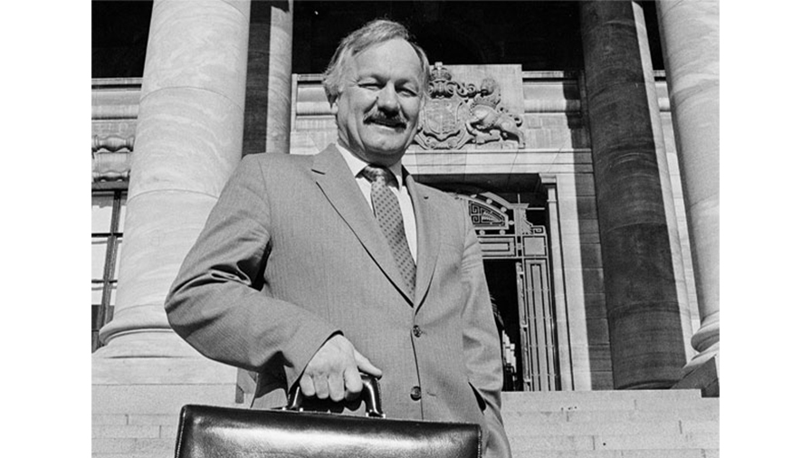 Roger Douglas on the steps of Parliament, 1984